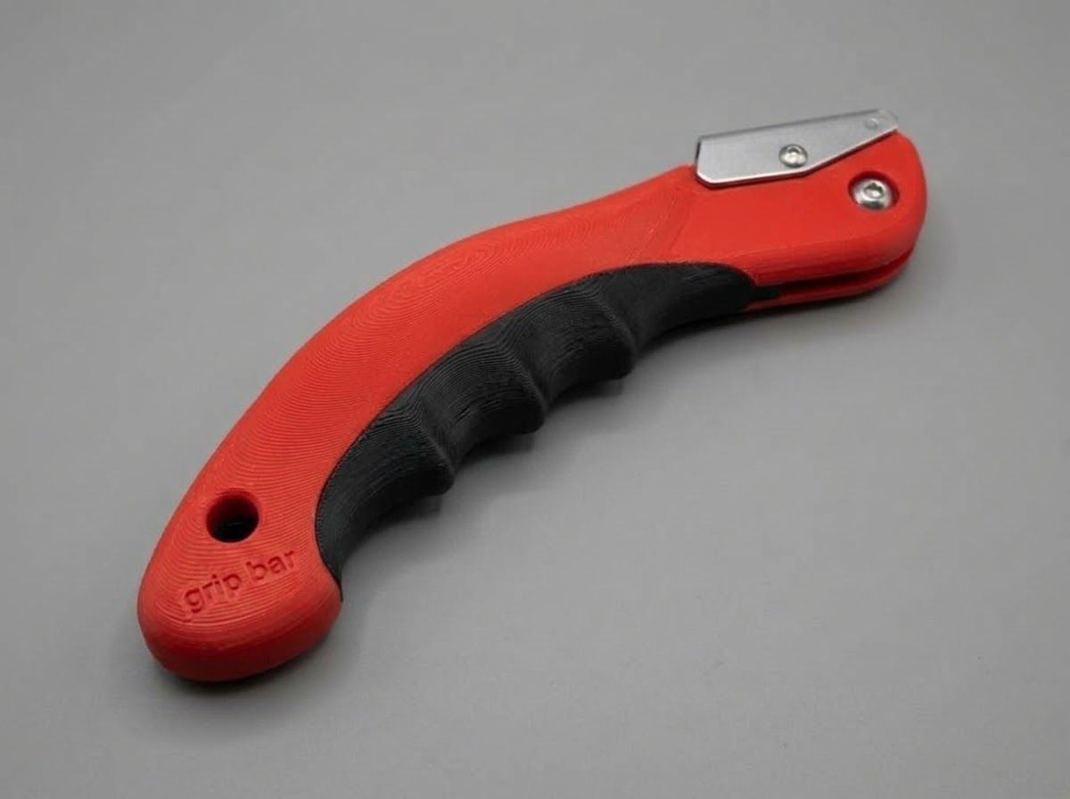 grip bar an einer Klinge montiert